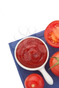 fresh tomato and ketchup isolated on white background