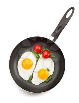 fried egg in frying pan isolated on white background