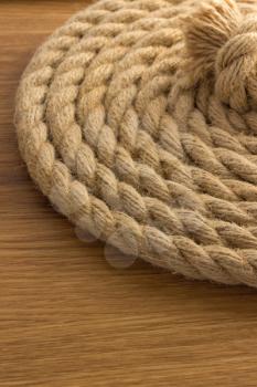 ship ropes on wooden background
