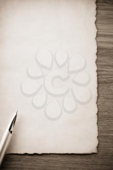gold pen on parchment background texture