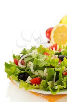 salad in plate isolated on white background