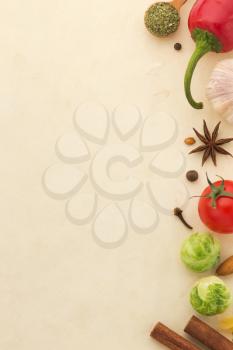 food ingredients and spices on aged background