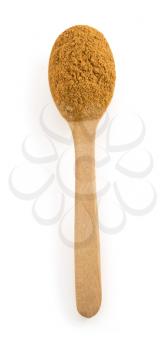 cinnamon in spoon isolated on white background