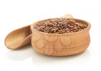 flax seeds in bowl isolated on white background