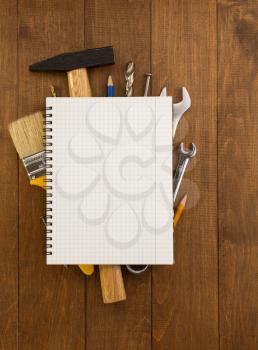 set of tools and instruments on wooden background