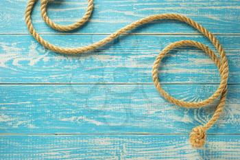 ship rope on wooden background