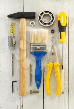 set of tools and instruments on wooden background