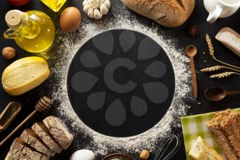 bread and bakery  ingredients on wooden background