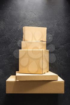 cardboard box on black background surface