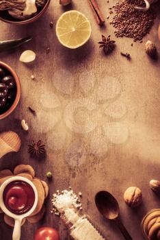 herbs and spices at stone table background