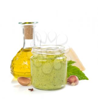 pesto sauce in jar isolated on white background