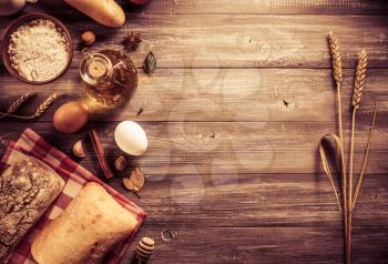 bread and bakery products on wood background