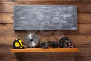 set of  tools and instruments on shelf background