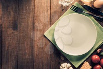plate and healthy food on wooden background texture