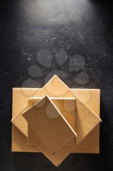 cardboard box on black background surface