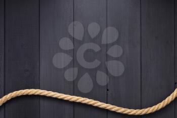 ship rope at wooden background, plank board texture