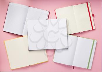 open notebook at abstract background surface
