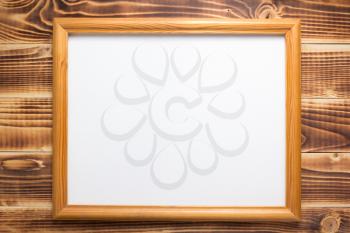 photo picture frame on wooden background wall