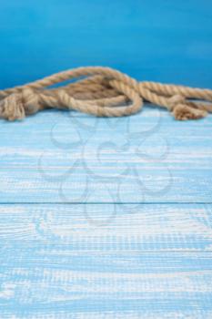ship rope at wooden board background texture