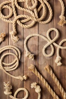 ship rope at wooden background texture, top veiw