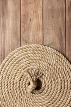 ship rope at wooden background texture, top veiw