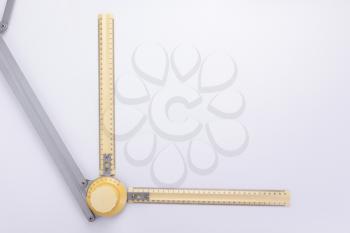 ruler from drafting or drawing table on white background, top view