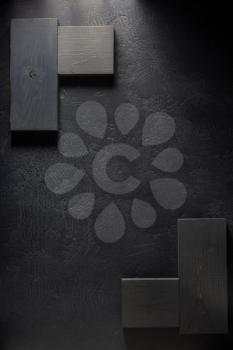 wooden board at black background texture