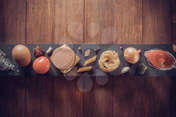 spice and herb on wooden background texture