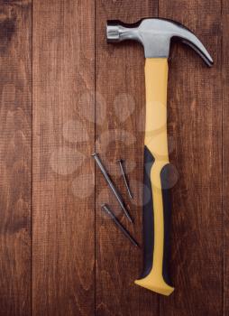 hammer tool on wooden background