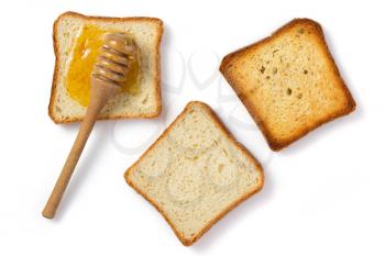 honey and bread isolated on white background