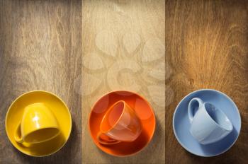 empty cup and saucer at wooden table background