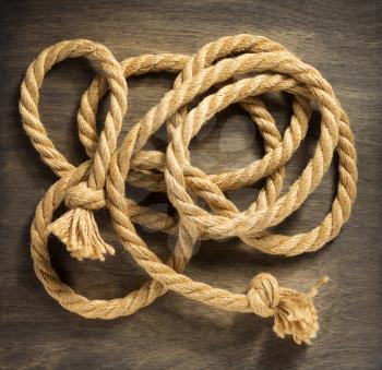 ship rope on aged wooden background