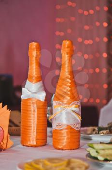 The decorated bottles from under the sparkling.