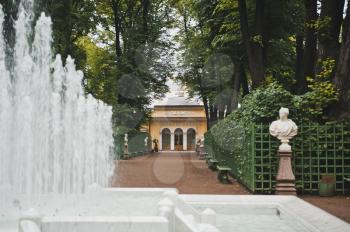 Beautiful fountain and view of the Coffee lodge located on Dvortsovaya Embankment Street.