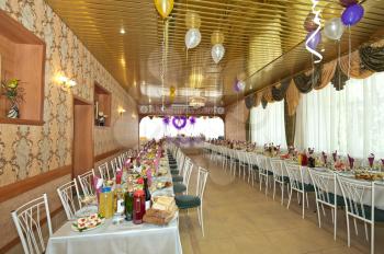 The halls decorated with spheres and a fabric.