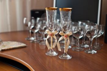 Set of glasses for wedding on a table.
