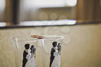 Glasses with drawing on wedding.