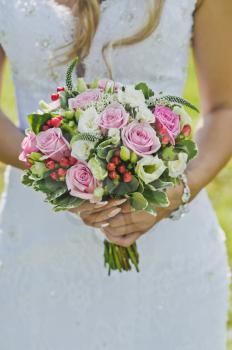 Bouquet in the hands of the bride.