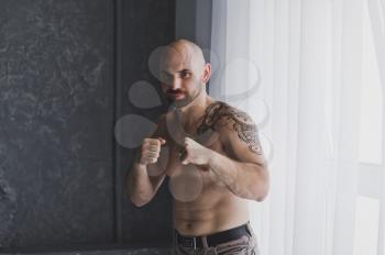 A man shows some Boxing techniques.