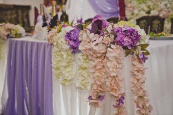 Decorated with flowers and fabric choice for the newlyweds.