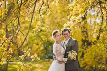 Couple on a walk on a Sunny autumn day.