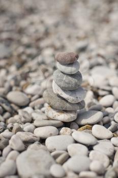 A pyramid of stacked flat pebble stones.