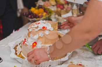 The couple shared a wedding cake for serving guests.