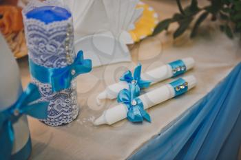 Two candles decorated with blue ribbons 733.