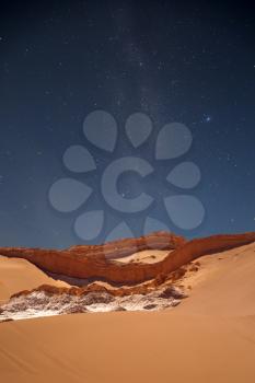 night sky. Amphitheatre is beautiful geological formation of Moon Valley in Atacama Desert, Chile
