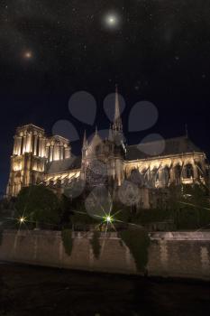 Notre Dame at night. Paris under the light of stars