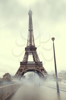 fog in Paris. Autumn morning at the Eiffel Tower.