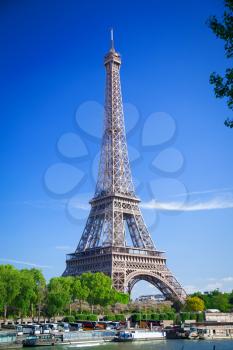 Eiffel Tower in Paris on a sunny summer day.