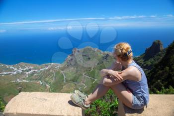girl on top of the mountain admiring the view. Tenerife. Canaria. Spain, Europe