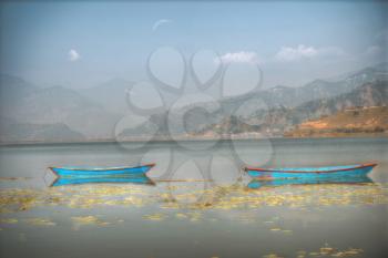 Lake Phewa - at the second largest lake in Nepal located in the Pokhara Valley near Pokhara and Sarangkot mountain